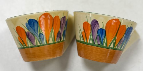 Lot 33 - A Clarice Cliff 'Crocus' pattern conical tea-for-two set
