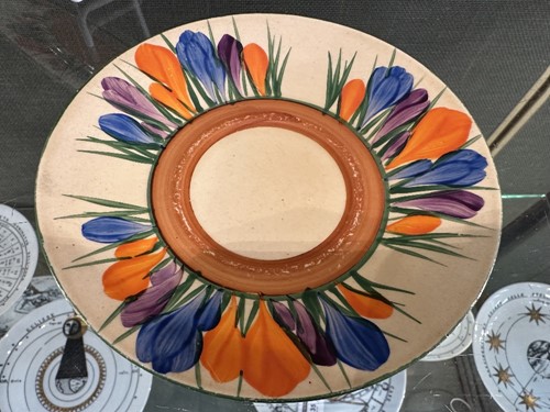 Lot 33 - A Clarice Cliff 'Crocus' pattern conical tea-for-two set