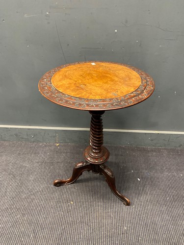 Lot 383 - A late Victorian oak tripod table with walnut...