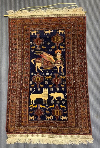 Lot 512 - A wall hanging, the field with a female winged...