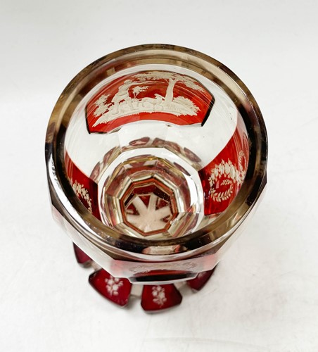 Lot 340 - A pair of Bohemian ruby flash cut goblets and covers, 19th century