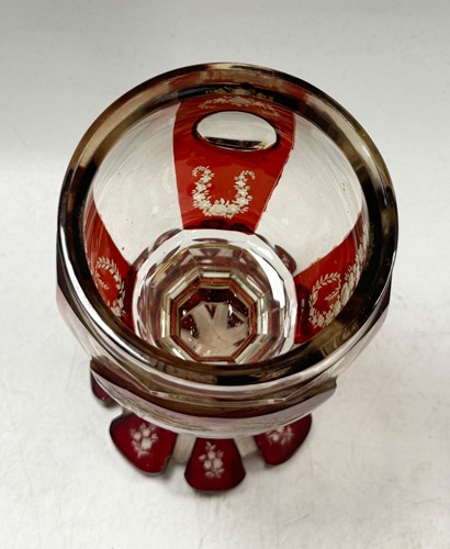 Lot 340 - A pair of Bohemian ruby flash cut goblets and covers, 19th century