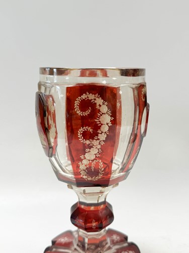 Lot 340 - A pair of Bohemian ruby flash cut goblets and covers, 19th century