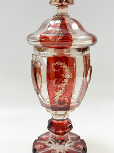 Lot 340 - A pair of Bohemian ruby flash cut goblets and covers, 19th century