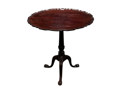 Lot 630 - George III tripod table with pie crust top 74...