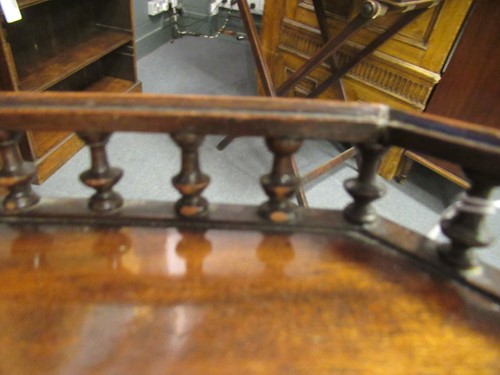 Lot 489 - An early George III carved mahogany kettle stand