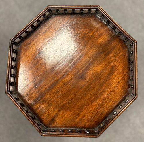 Lot 489 - An early George III carved mahogany kettle stand