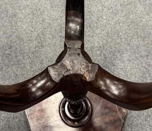 Lot 489 - An early George III carved mahogany kettle stand