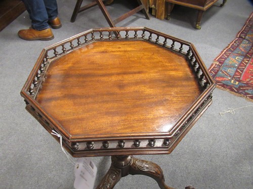 Lot 489 - An early George III carved mahogany kettle stand