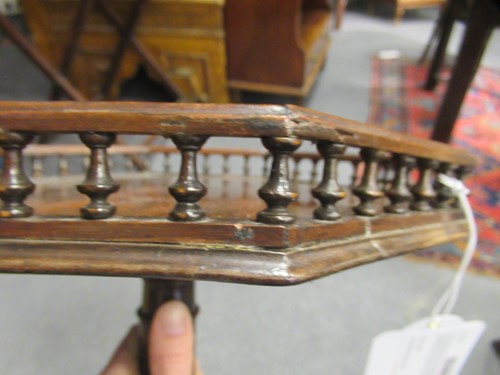 Lot 489 - An early George III carved mahogany kettle stand