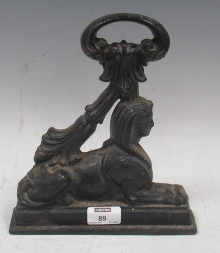 Lot 89 - A cast iron doorstop modelled as a sphinx