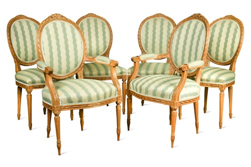 Lot 540 - A set of ten Louis XVI style beech wood dining chairs