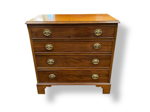 Lot 632 - A George III style mahogany chest of four long...