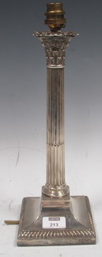 Lot 213 - A silver table lamp, modelled as corinthian...