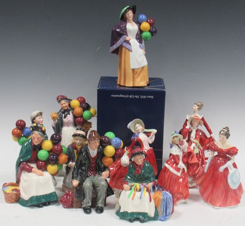 Lot 148 - A group of Royal Doulton figurines, to include,...