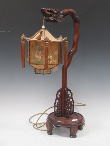 Lot 149 - Chinese hardwood table lamp, 20th century, the...