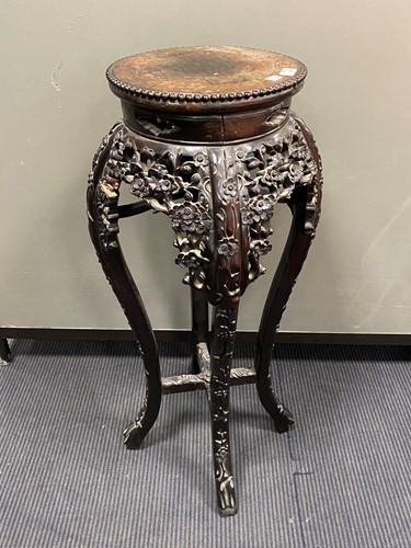 Lot 489 - An early 20th century Chinese urn stand with...