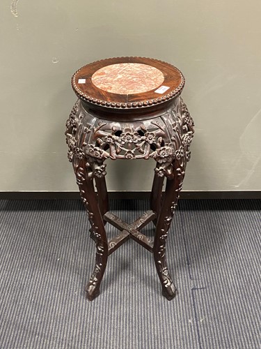 Lot 490 - An early 20th century marble top urn stand...