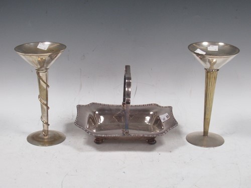Lot 198 - Two Art Deco style white metal candlesticks of...