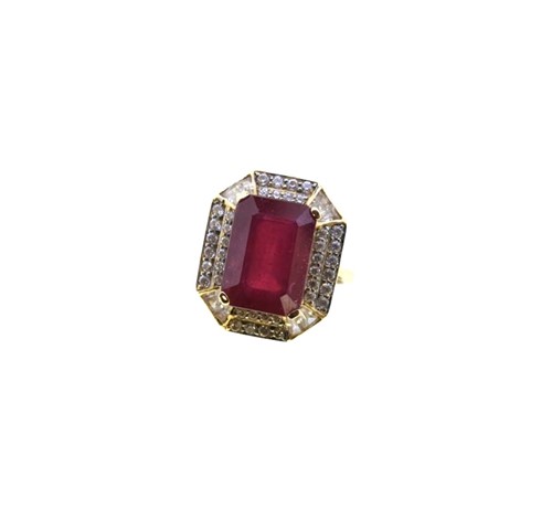 Lot 17 - A glass filled ruby and zircon ring