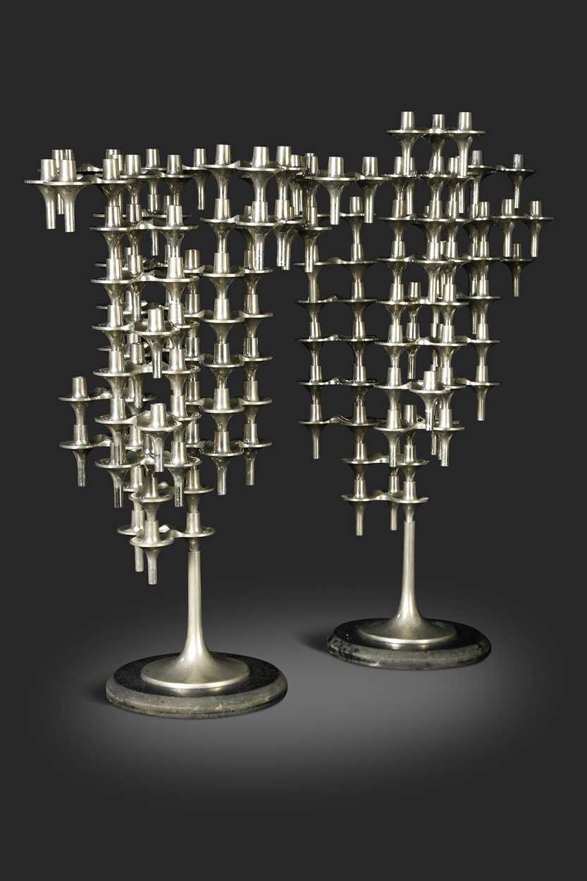 Lot 145 - Fritz Nagel, a pair of modular polished metal candlesticks, mid-20th century