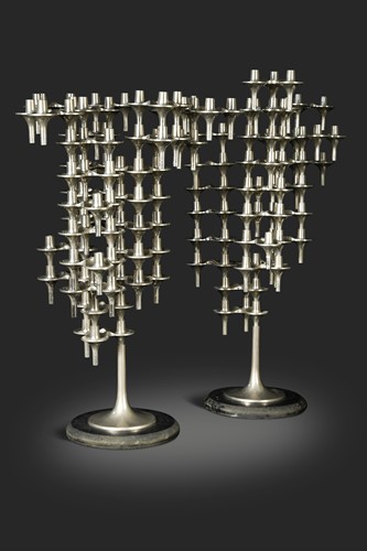 Lot 145 - Fritz Nagel, a pair of modular polished metal candlesticks, mid-20th century