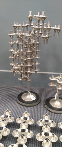 Lot 145 - Fritz Nagel, a pair of modular polished metal candlesticks, mid-20th century