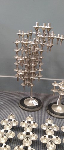 Lot 145 - Fritz Nagel, a pair of modular polished metal candlesticks, mid-20th century