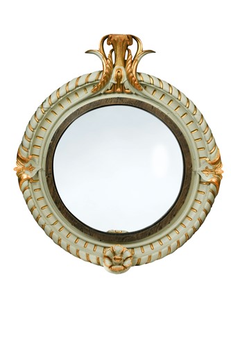 Lot 567 - A painted and parcel gilt convex mirror, late 19th century