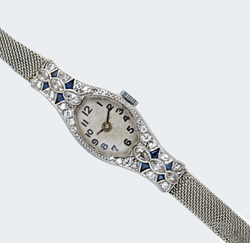 Lot 238 - Unsigned - A diamond and sapphire set cocktail watch