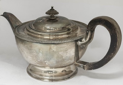 Lot 546 - A George VI silver teapot