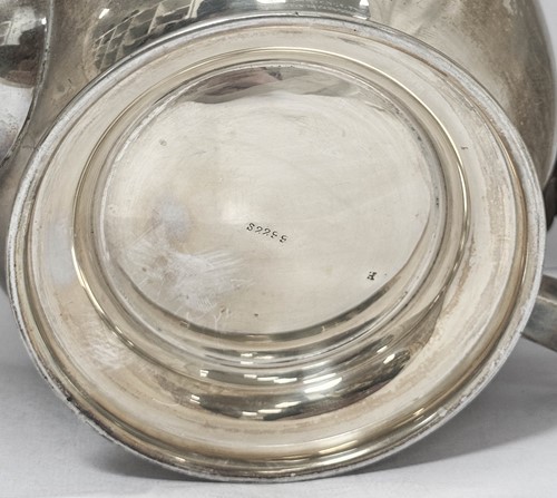 Lot 546 - A George VI silver teapot