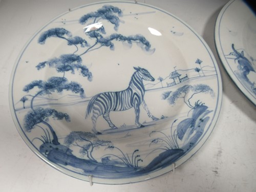 Lot 23 - Eight blue and white Delft style 'Exotic...