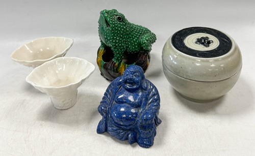 Lot 62 - A Chinese egg and spinach glazed porcelain toad, Qing Dynasty, 19th century