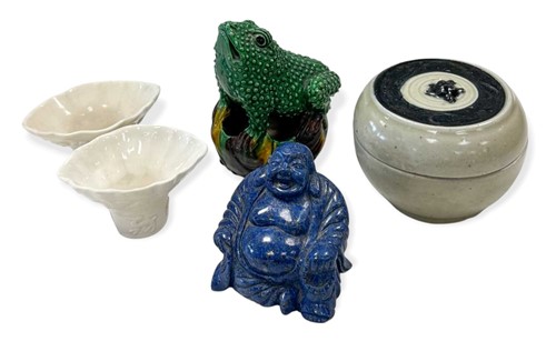 Lot 62 - A Chinese egg and spinach glazed porcelain toad, Qing Dynasty, 19th century