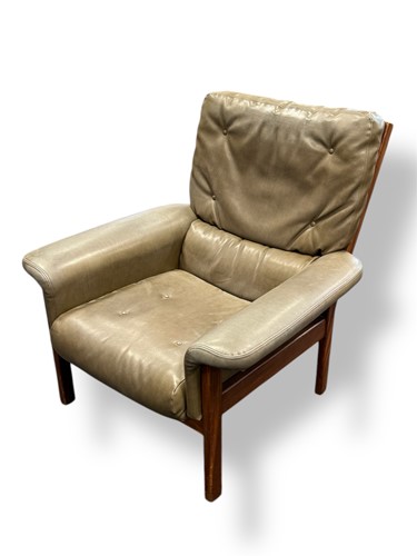 Lot 545 - A dark green leather upholstered chair and a...