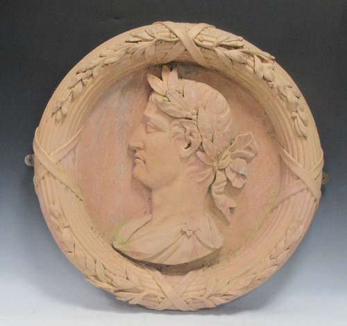 Lot 796 - A terracotta-effect resin garden roundel,...