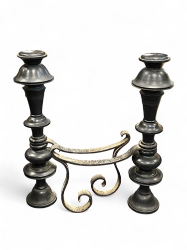 Lot 689 - A pair of Hispanic black painted cast iron...