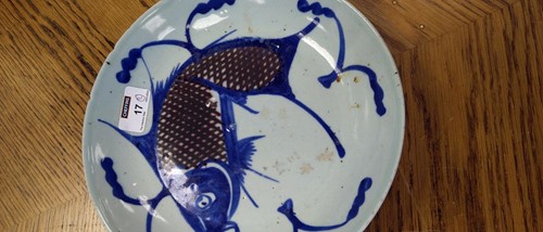 Lot 17 - Chinese blue and white dish painted with a...