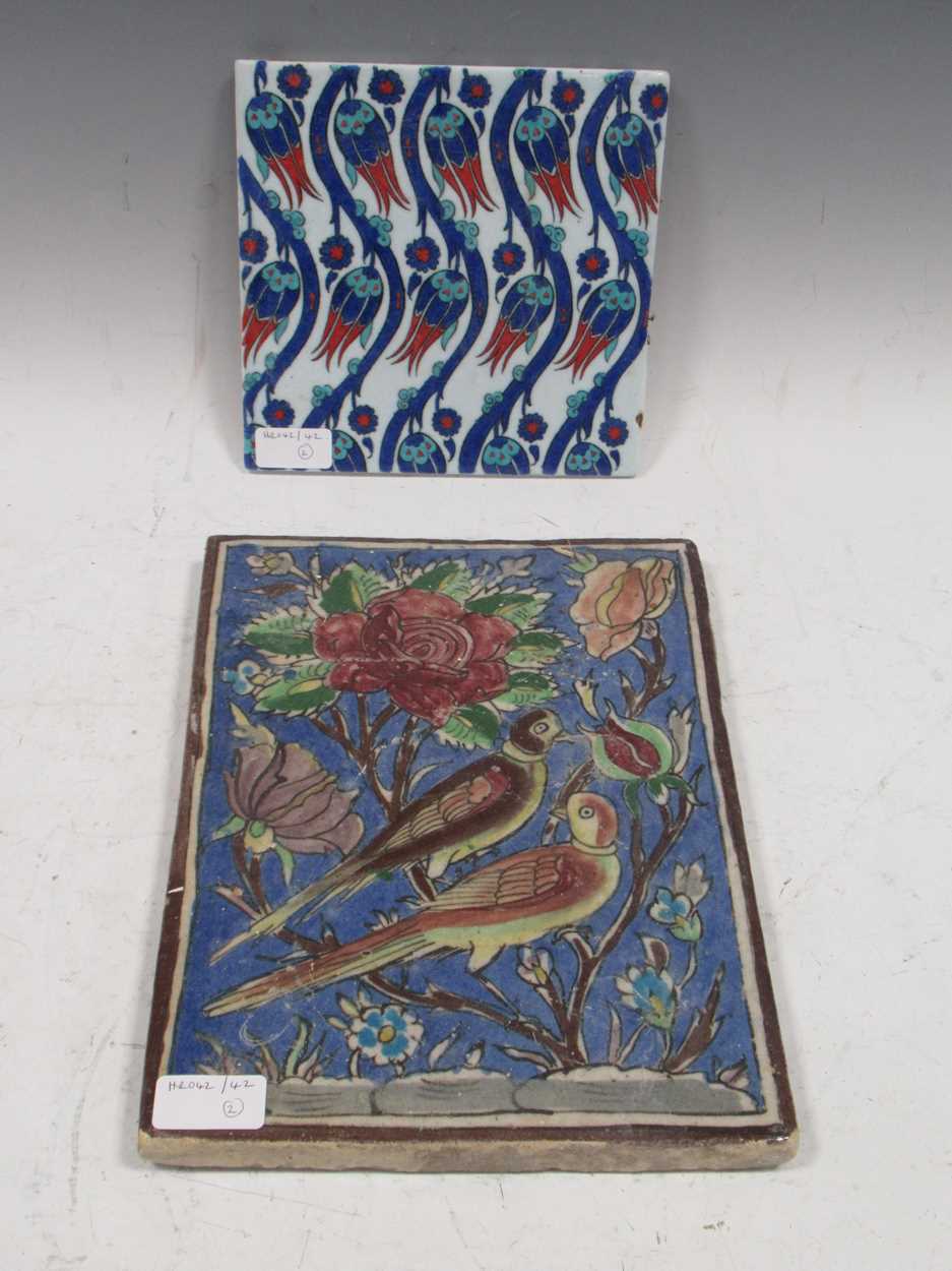 Lot 12 - Iznik pottery tile with repeating tulip design...