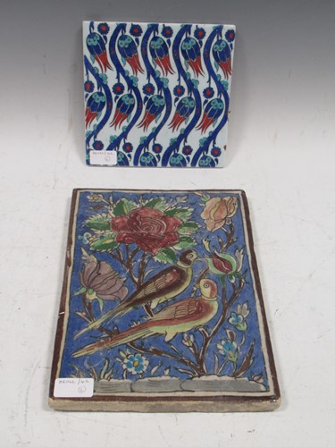 Lot 12 - Iznik pottery tile with repeating tulip design...