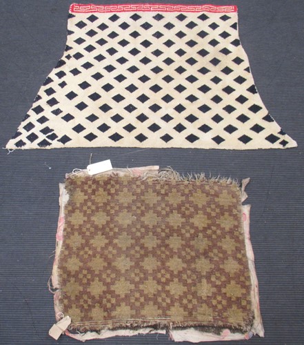 Lot 670 - A Tibetan black and white horse saddle rug,...