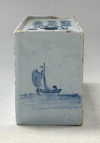 Lot 285 - A Delft blue and white flower brick, circa 1750