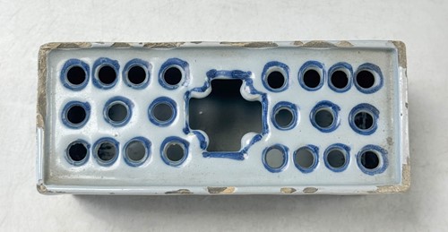 Lot 285 - A Delft blue and white flower brick, circa 1750