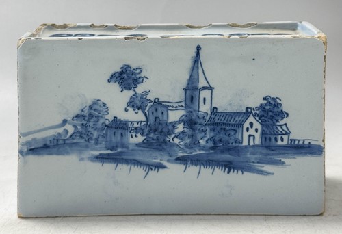 Lot 285 - A Delft blue and white flower brick, circa 1750
