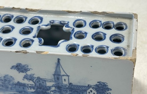 Lot 285 - A Delft blue and white flower brick, circa 1750