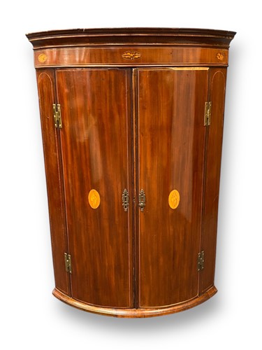 Lot 758 - An Edwardian mahogany bow fronted corner...