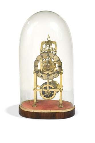 Lot 700 - A small size Skeleton timepiece, 19th century
