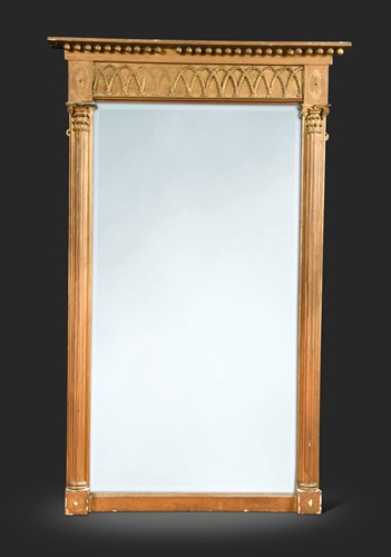 Lot 599 - A pair of Regency giltwood pier mirrors