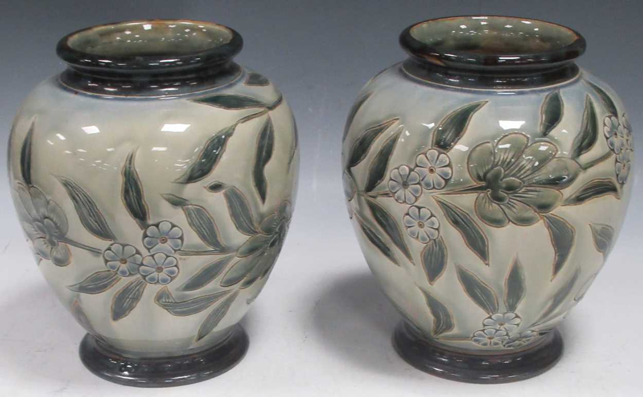 Lot 18 - A pair of Doulton stoneware vases, 24cm high